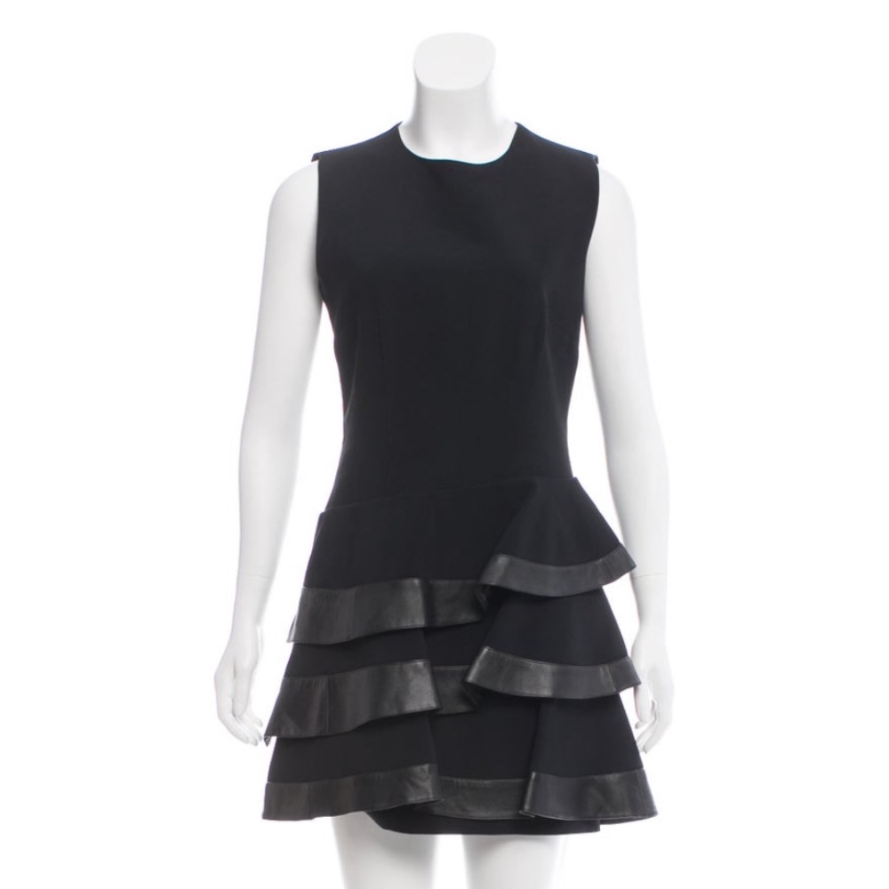 Emanuel Ungaro
Leather-Trimmed Ruffled Dress
Size: MIUS8, FR40 color Black